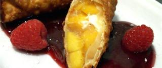 Quick and Easy Peach Pie Egg Rolls with Raspberry Sauce Photo