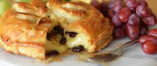 Baked Brie en Croûte with Honey, Dried Cherries, Rosemary & Pecans Photo