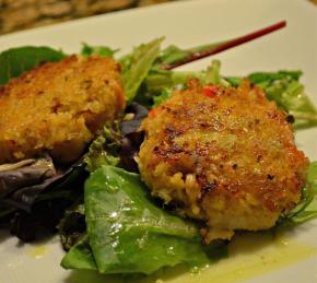 Deviled Crab Cakes on Mixed Greens with Ginger-Citrus Vinaigrette Photo