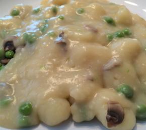 Ricotta Gnocchi with Fresh Peas and Mushrooms Photo