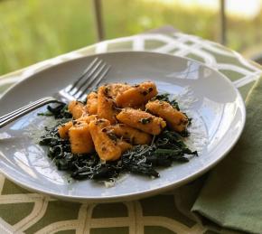 Butternut Squash Gnocchi with Garlic-Sage Butter over Wilted Spinach Photo