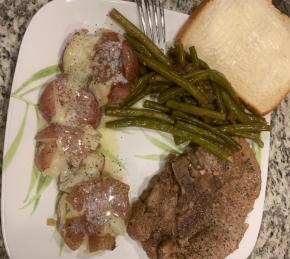 Pressure Cooker Bone-In Pork Chops, Baked Potatoes, and Carrots Photo