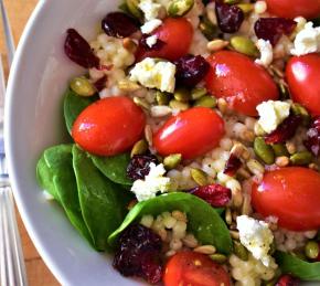 Couscous Salad with Kale, Tomatoes, Cranberries, and Feta Photo