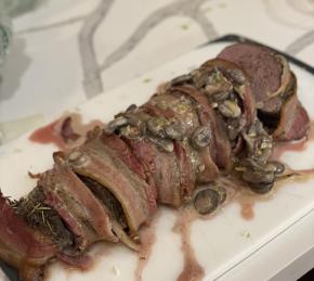 Bacon-Wrapped Venison Tenderloin with Garlic Cream Sauce Photo