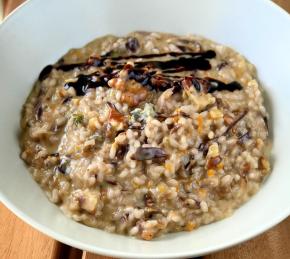 Risotto Con Radicchio, Gorgonzola, Noci, e Crema di Balsamico Photo